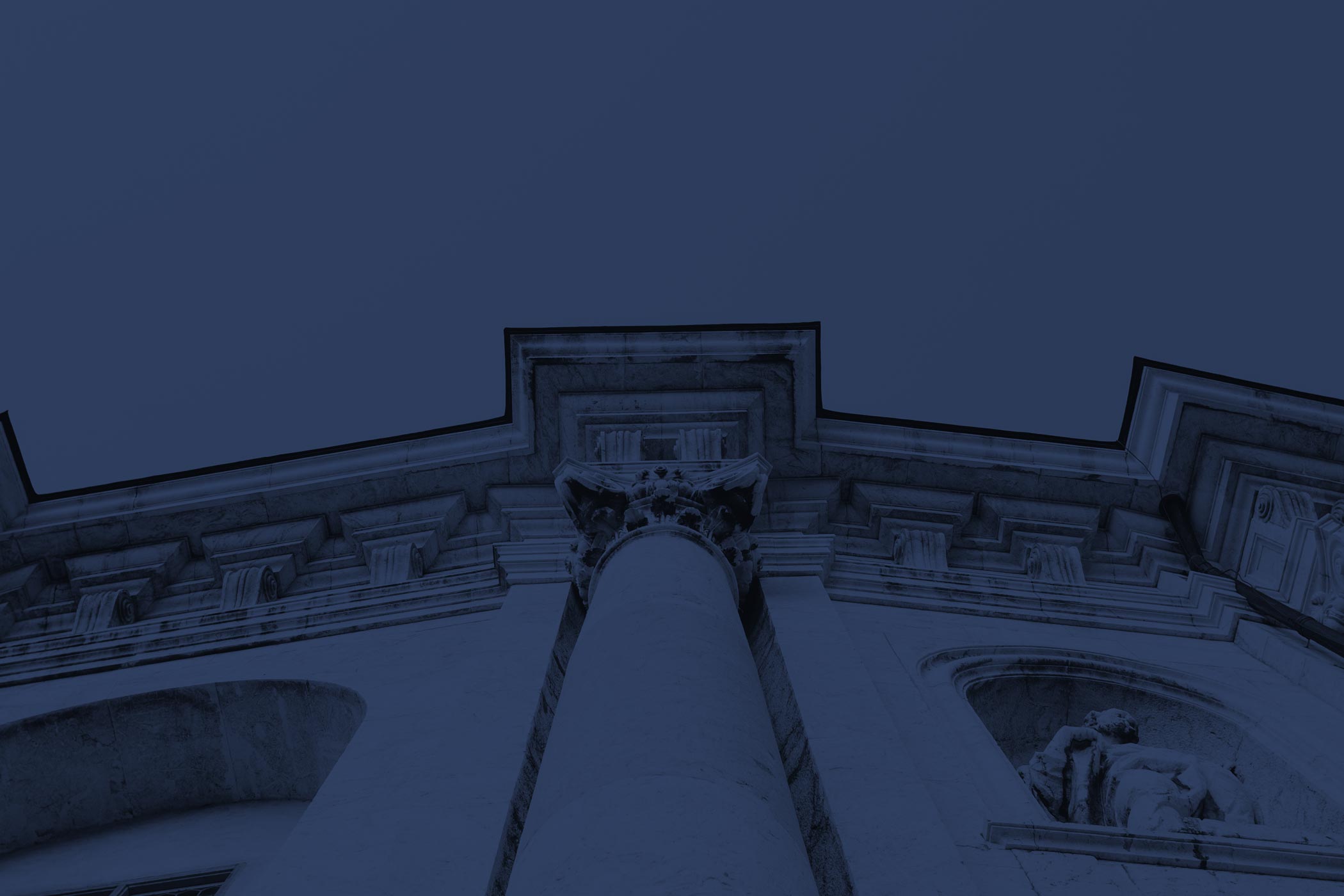 Upward view of what appears to be a courthouse